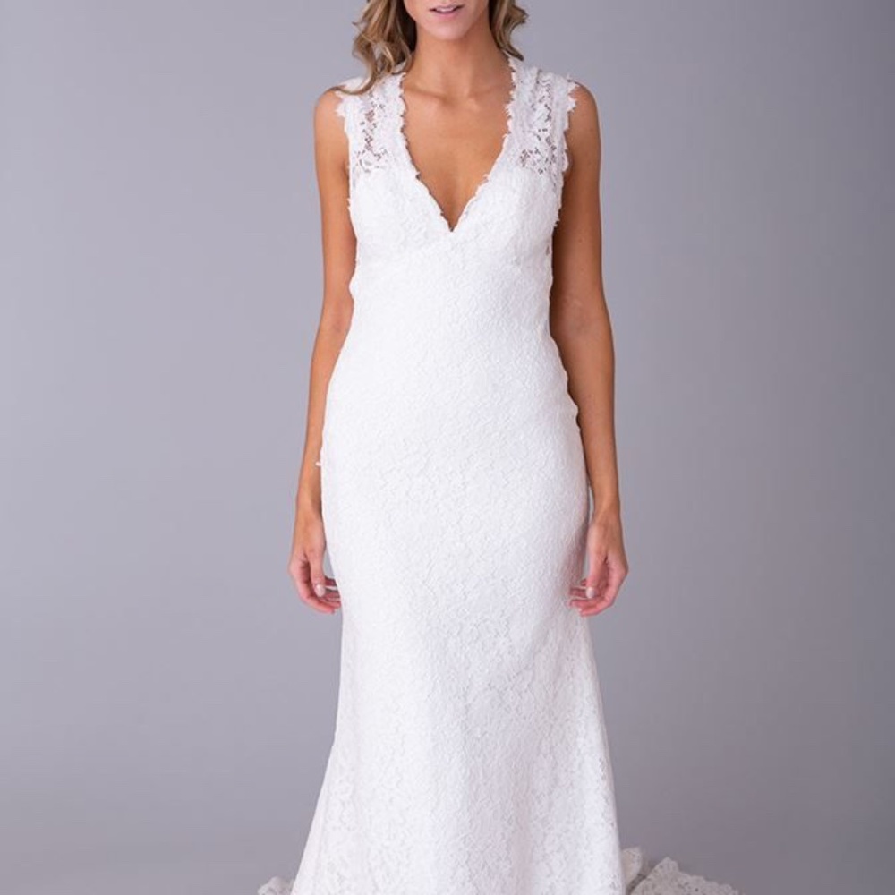 New unaltered Louvienne classic lace wedding dress